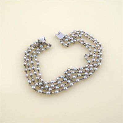 Appraisal: A seed pearl multi-strand bracelet fashioned as four seed pearl