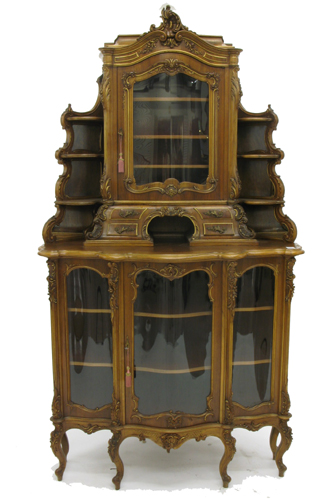 Appraisal: LOUIS XV STYLE CARVED AND PARCEL-GILT WALNUT CORNER CABINET French