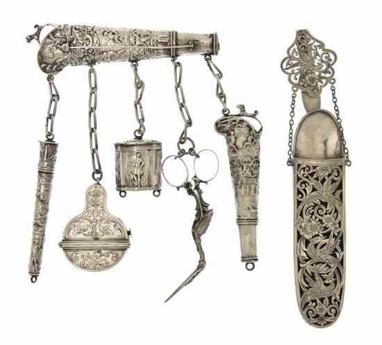 Appraisal: A Dutch Silver Chatelaine th century the tapering repousee bottle