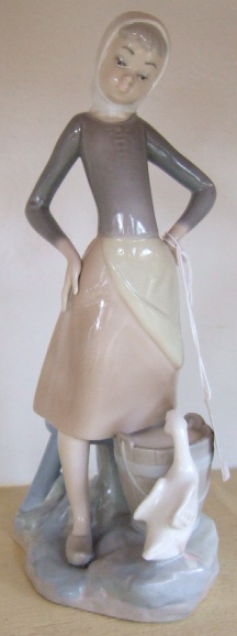 Appraisal: A Lladro figure of a girl with bucket figure number