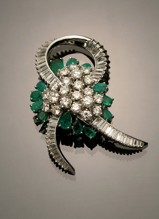 Appraisal: Platinum Diamond and Emerald Floral Brooch Set with twenty round