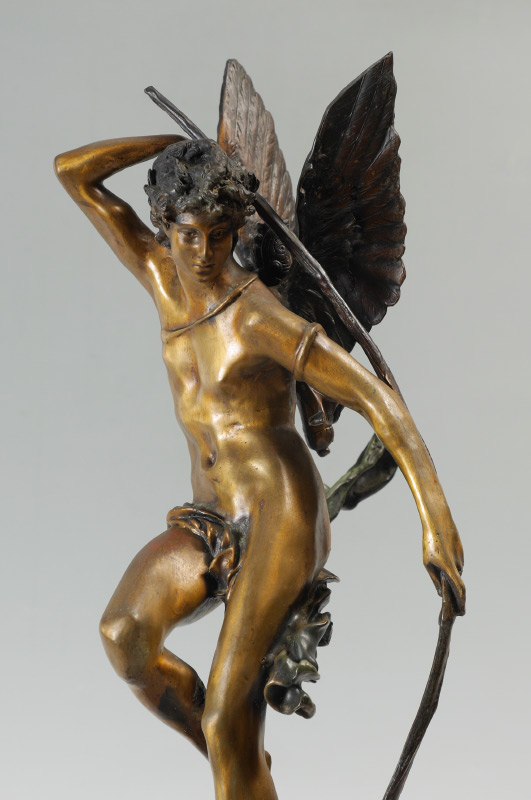 Appraisal: BRONZE OF CUPID WITH BOW AND ARROW Cast within the