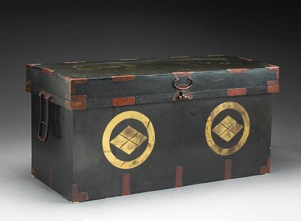 Appraisal: A large gilt and black lacquer clothing chest th Century