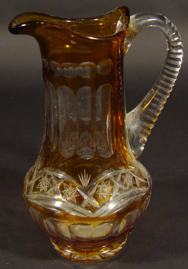 Appraisal: Amber flashed cut glass water jug cm high