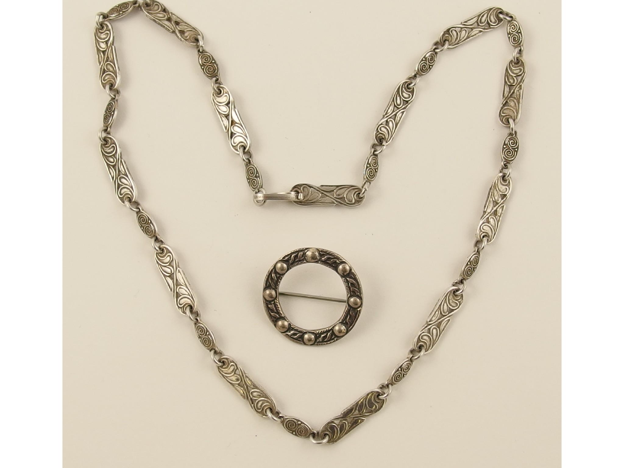 Appraisal: A silver necklace of Viking inspired design together with a