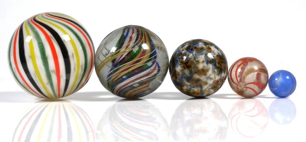 Appraisal: More than five dozen vintage marbles mostly what appear to