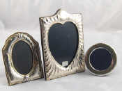 Appraisal: Three silver photo frames x cm boxed x cm and