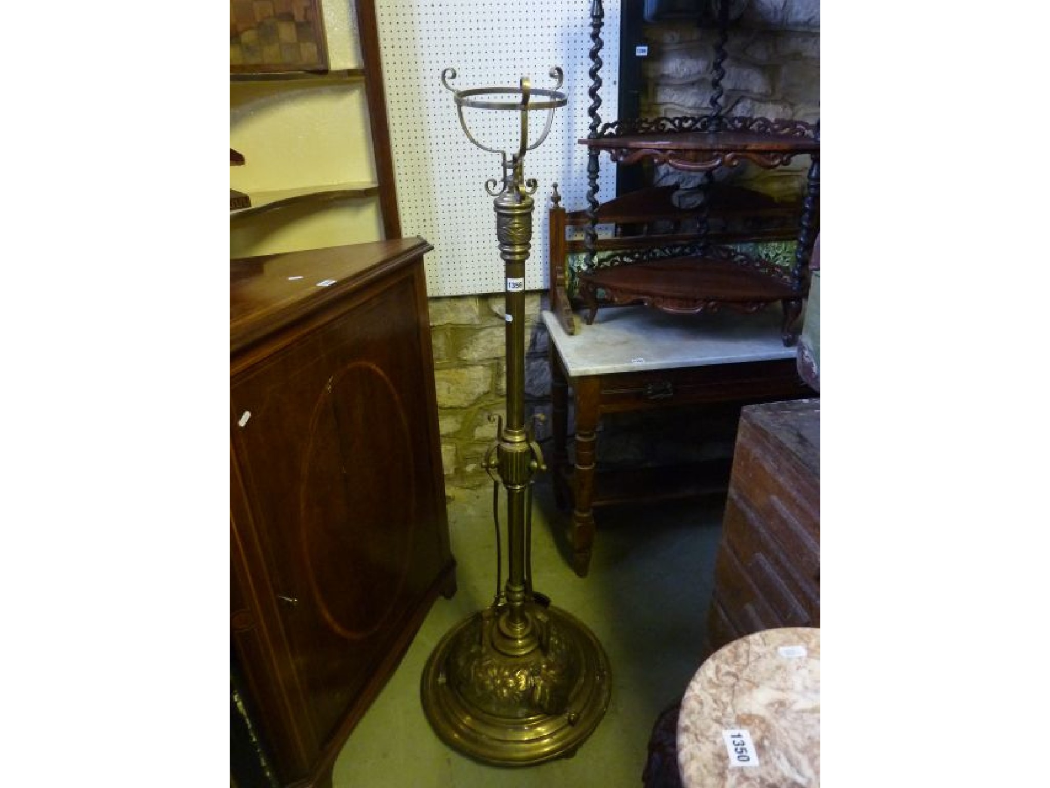 Appraisal: A Victorian brass telescopic oil lamp standard the circular domed