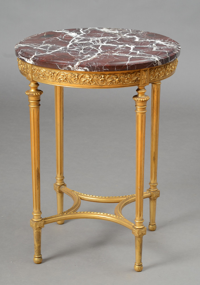 Appraisal: LOUIS XVI STYLE GILTWOOD GU RIDON With a circular veined