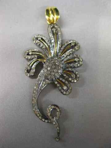 Appraisal: Diamond Pendant fancy flower loaded with diamonds totaling carats in