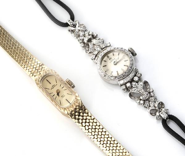 Appraisal: A diamond and platinum wristwatch Omega together with a karat