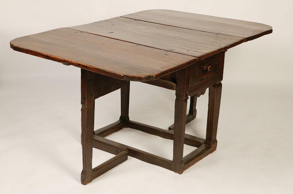 Appraisal: AN ANGLO-DUTCH OAK GATELEG TABLE the rectangular top with twin