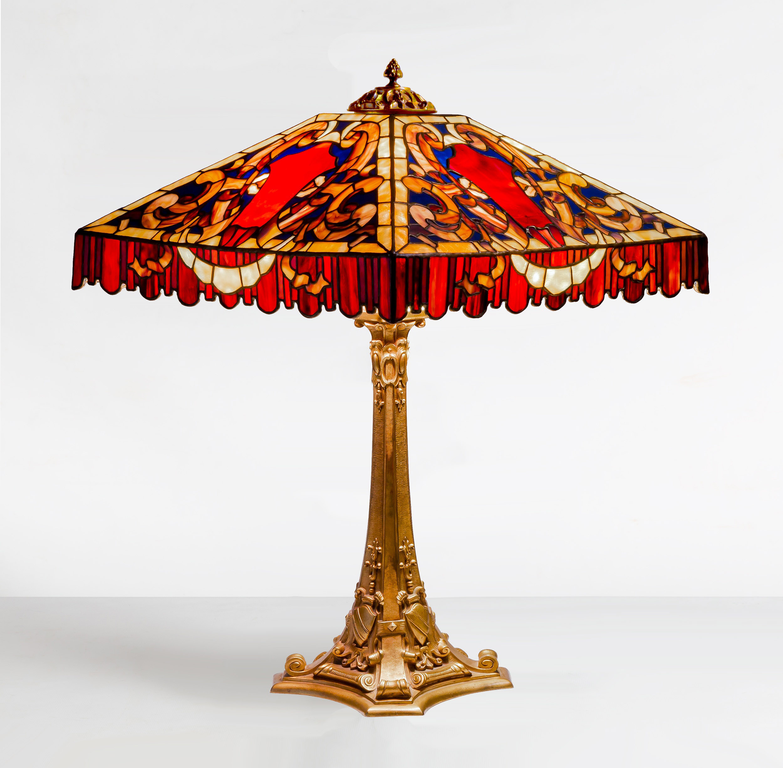 Appraisal: DUFFNER KIMBERLY ELIZABETHAN TABLE LAMP circa leaded glass and patinaed