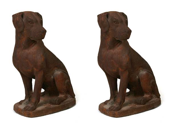 Appraisal: A pair of cast iron dogs height in width in