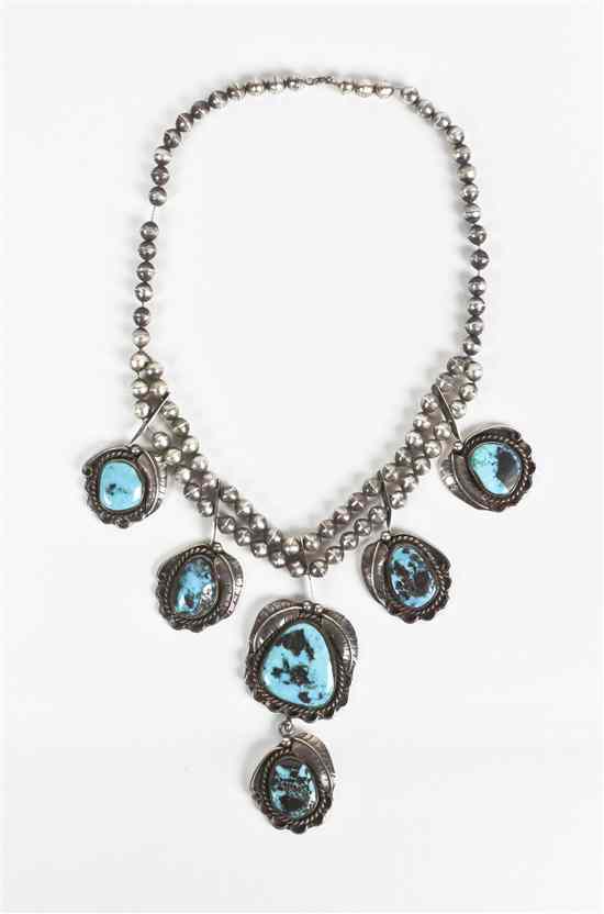 Appraisal: A Zuni Necklace and Earrings comprised of six stones in