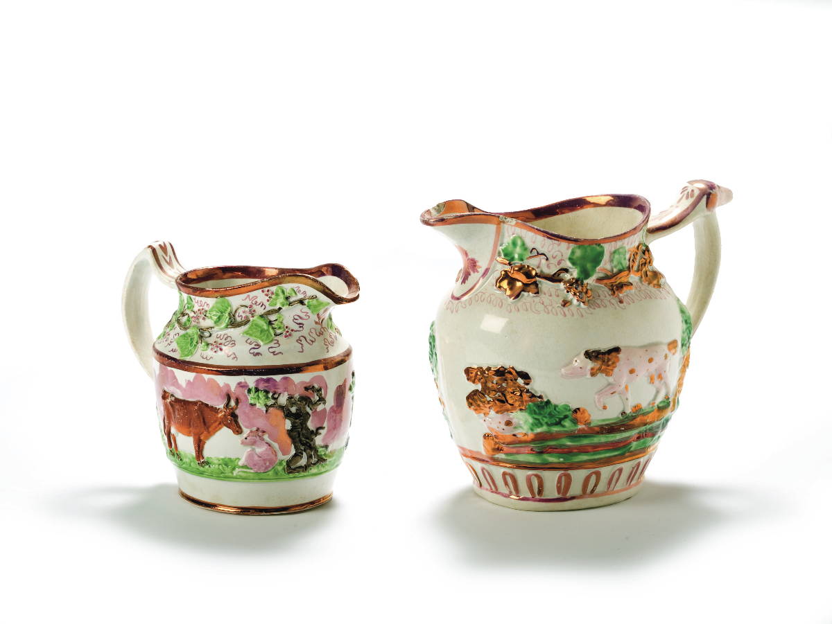 Appraisal: TWO STAFFORDSHIRE PINK LUSTRE AND ENAMEL-DECORATED SPORTING JUGS CIRCA -