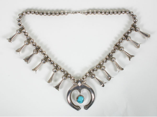 Appraisal: Native American silver squash blossom necklace the naja with polished