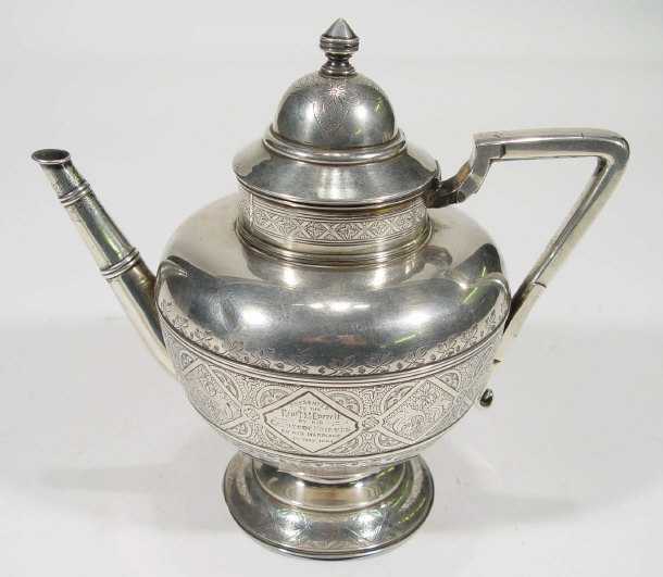 Appraisal: Aesthetic silver teapot with chased decoration London cm high