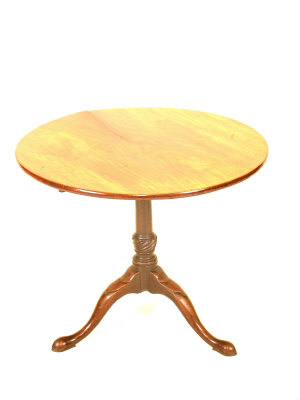 Appraisal: A George II mahogany circular tripod table upon a bird