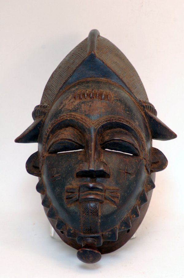 Appraisal: Baule face mask with characteristic rounded face with pointed chin