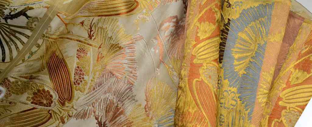 Appraisal: Japanese Obi Silk MaterialDepicting lotus blossom stiff petals and fans