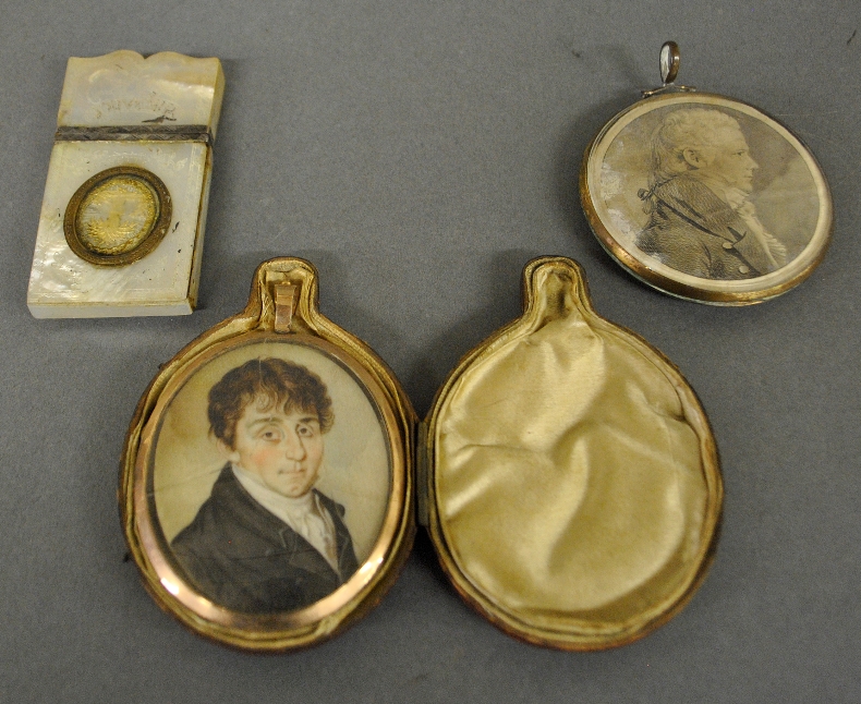 Appraisal: - Oval miniature portrait of a young man h in