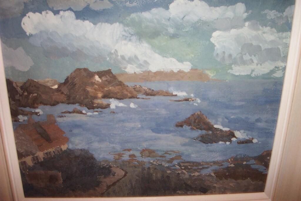 Appraisal: An oil painting on board of a coastal landscape with