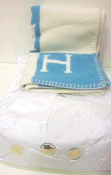 Appraisal: AN HERMES BLANKET IN WHITE AND BABY BLUE AN HERMES