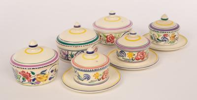 Appraisal: Poole Pottery three floral butter dishes with lids cm diameter