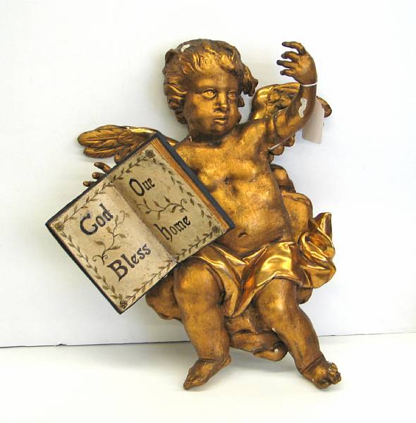 Appraisal: An Italian giltwood figure of a putto second half th