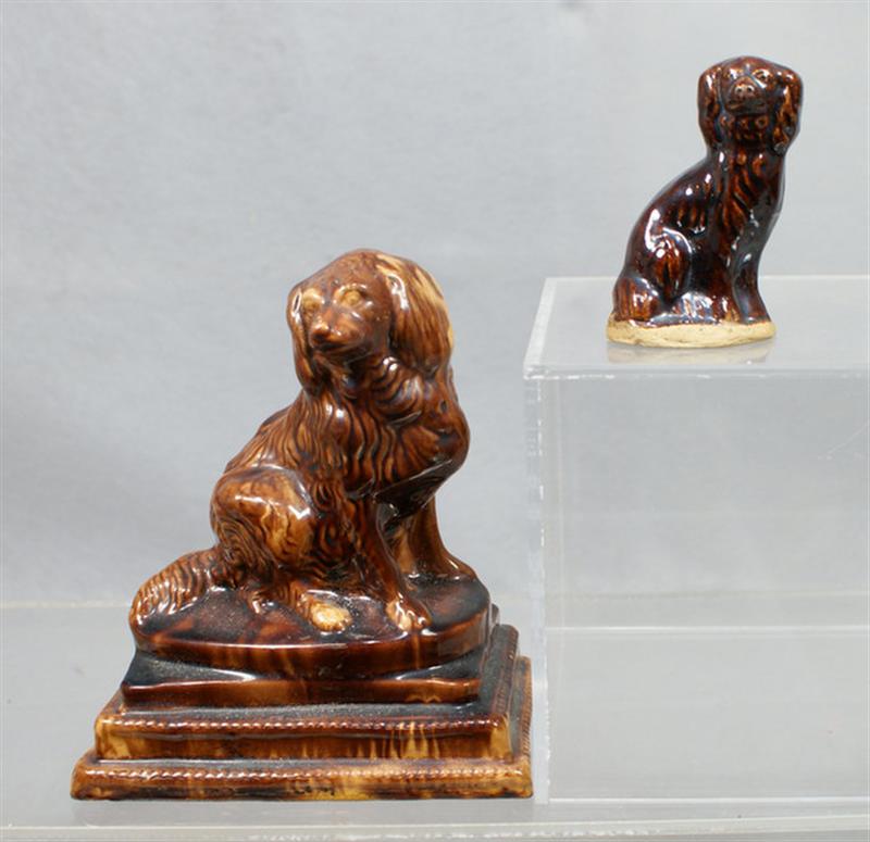 Appraisal: Rockingham spaniel on triple platform base h with another small