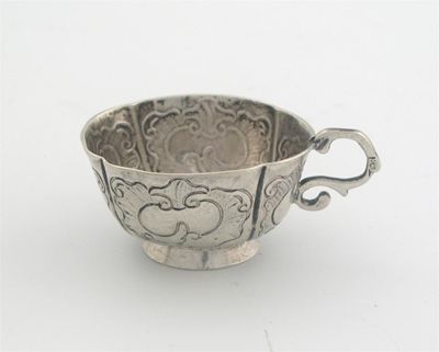 Appraisal: A late th century Russian vodka cup scroll handle and