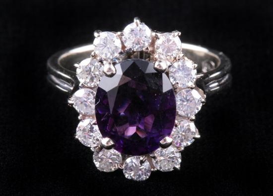 Appraisal: K WHITE GOLD AMETHYST AND DIAMOND RING Oval ct amethyst