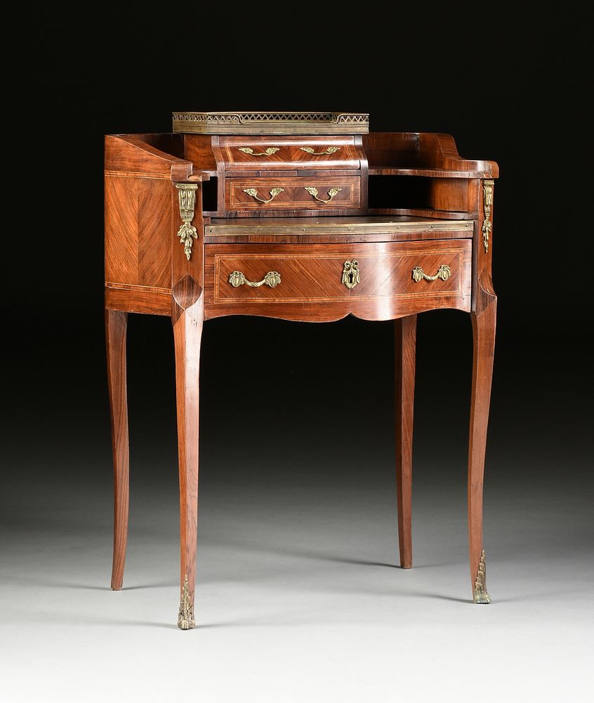 Appraisal: A CARLTON HOUSE STYLE BRASS MOUNTED INLAID MAHOGANY LEATHER TOP