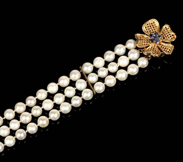 Appraisal: A three strand cultured pearl bracelet length in