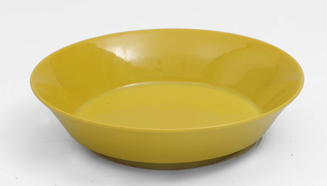 Appraisal: A Chinese yellow ground porcelain saucer dishJiaqing - of plain