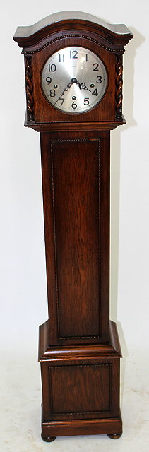 Appraisal: A SMALL SIZED OAK CASED LONG CASED CLOCK the hood