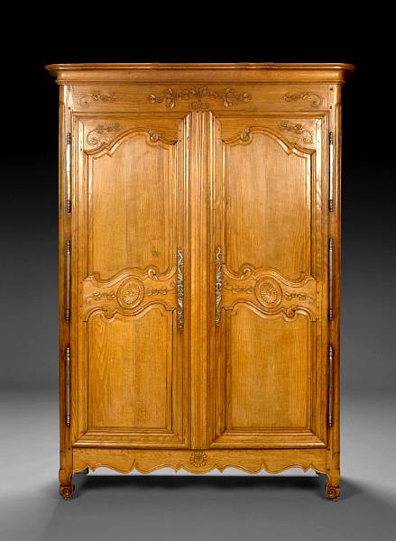 Appraisal: A Louis XV Provincial carved oak armoire second half th