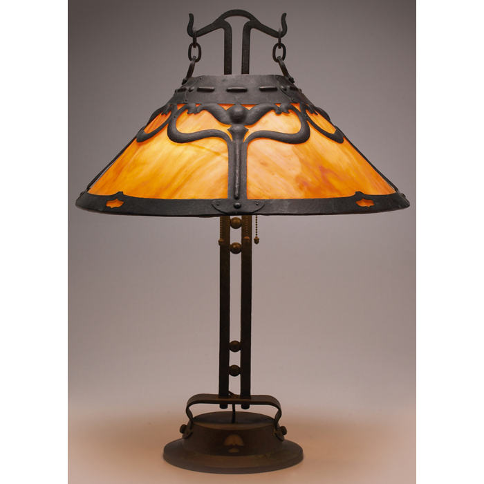 Appraisal: Handel lamp bronzed metal base with cut-out designs over glass