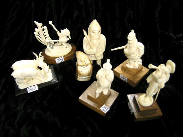 Appraisal: Collection of European Carved Ivory Figurines hunters gnome Biliken more