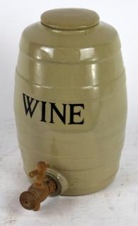 Appraisal: English ceramic wine cask with wooden spigot h x w