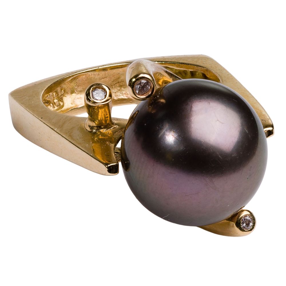 Appraisal: K YELLOW GOLD TAHITIAN PEARL AND DIAMOND RINGSculptural style having