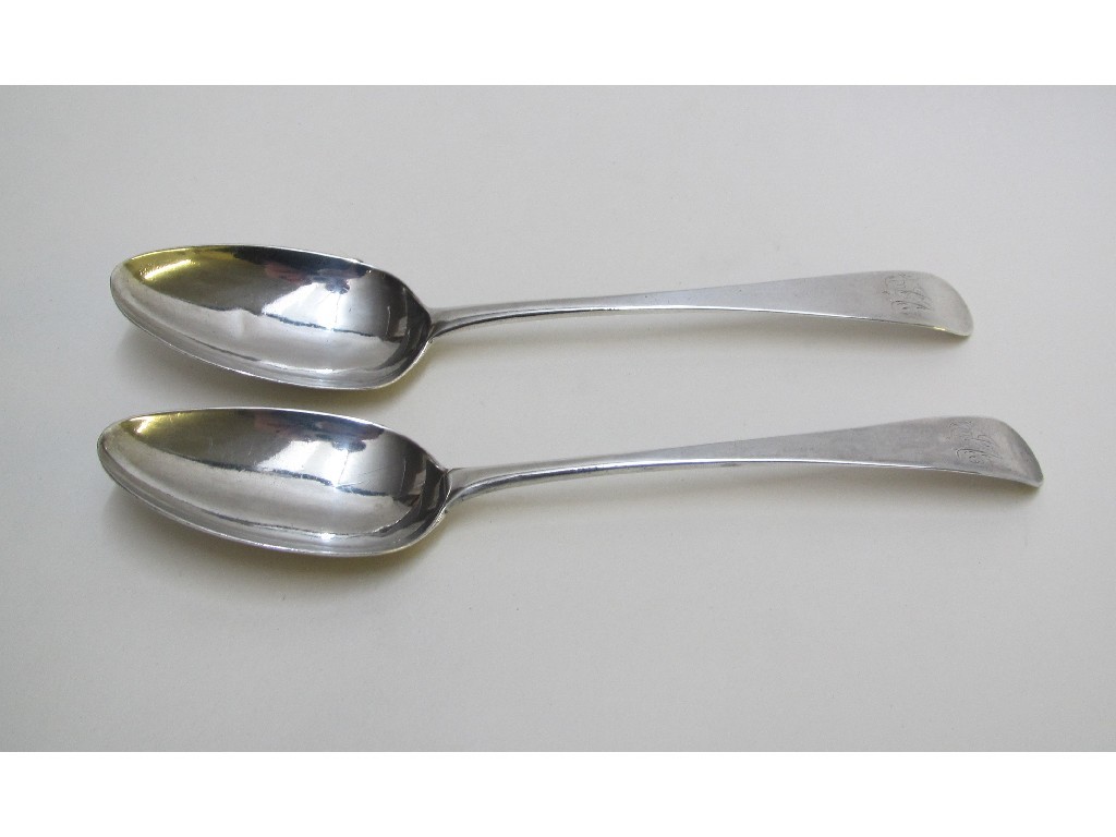 Appraisal: A pair of George III silver soup spoons with engraved