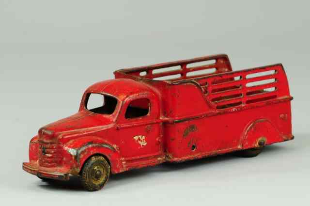 Appraisal: INTERNATIONAL STAKE TRUCK Arcade cast iron painted in red overall