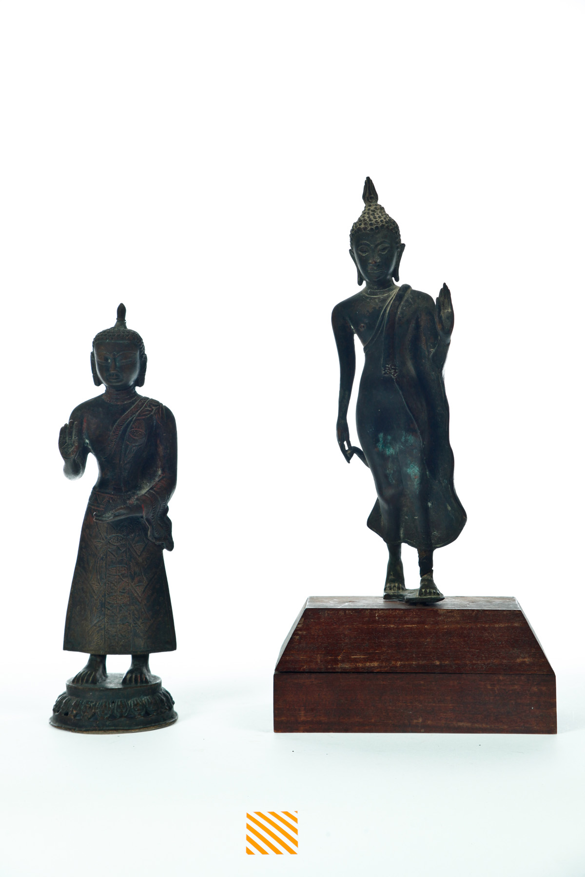 Appraisal: TWO BRONZE BUDDHAS Asian early th century Standing robed figures