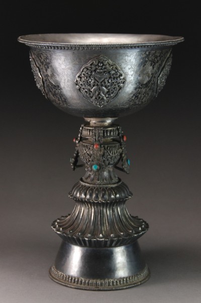 Appraisal: Impressive engraved bowl with four applied silver emblems mounted on