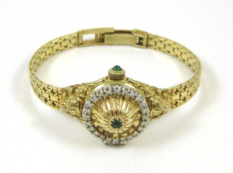 Appraisal: FABERGE DIAMOND AND FOURTEEN KARAT GOLD INTEGRAL BRACELET WRIST WATCH