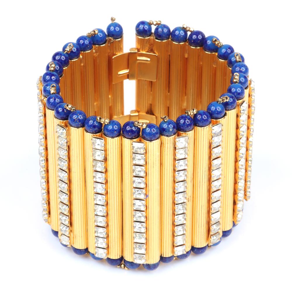 Appraisal: WILLIAM DE LILLO WIDE GOLD TONE CUFF BRACELET MADE FROM