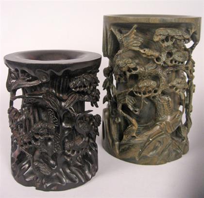 Appraisal: Two Chinese hardwood brushpots th century The largest with rosewood-like