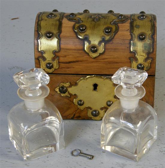 Appraisal: Victorian walnut and brass bound domed box containing two perfume